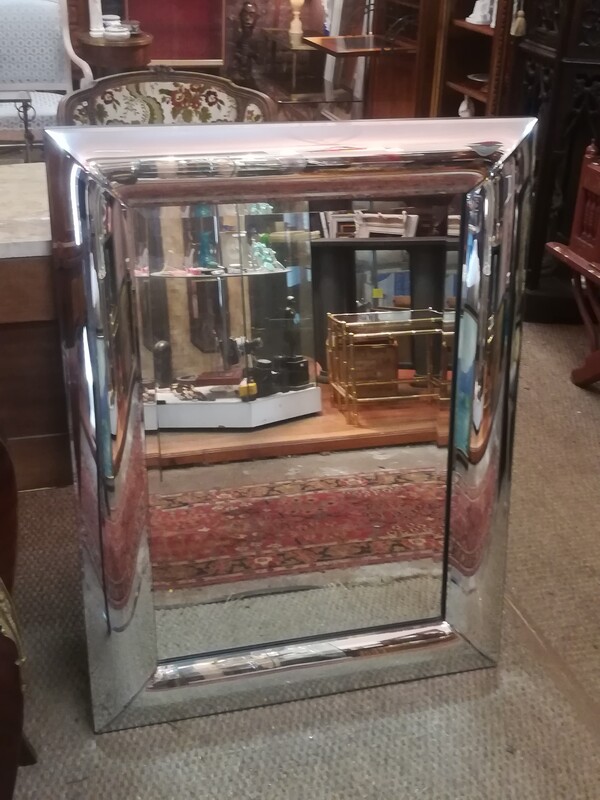 Beveled and curved glass bead mirror