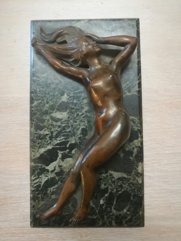 Bronze naked woman lying on a marble base clipboard 