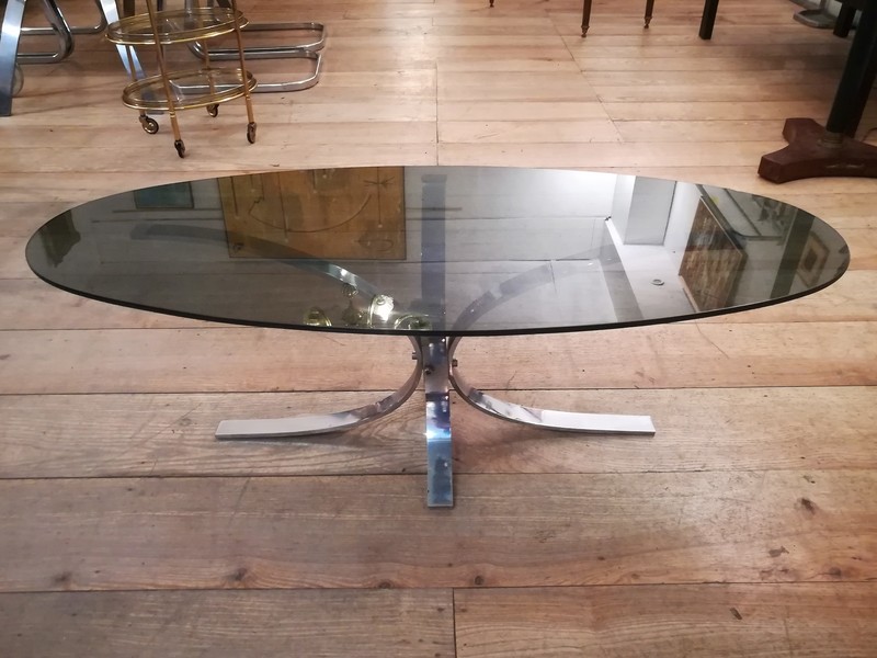 Chrome steel coffee table with smoked oval glass top