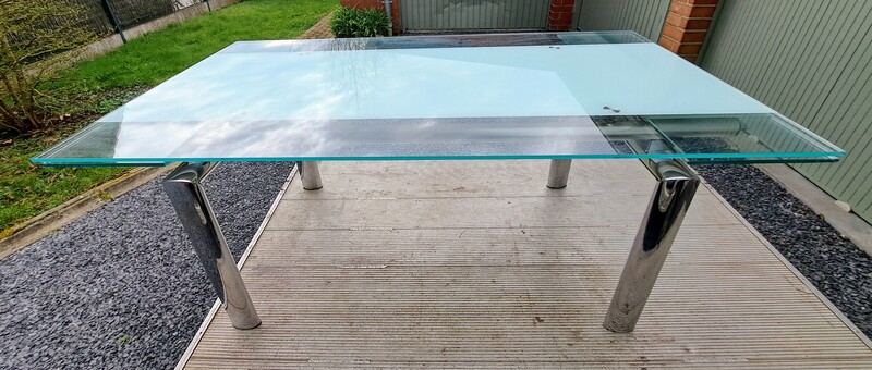 Extendable table in chromed steel and tempered glass