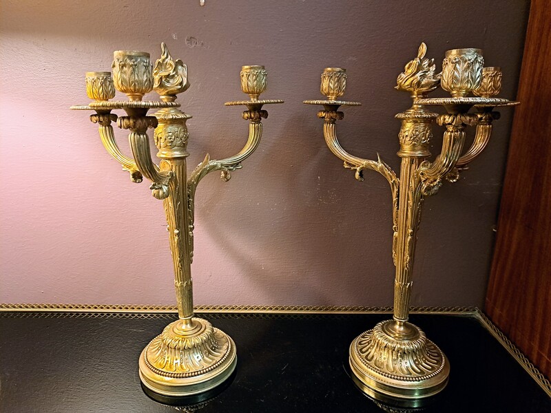 Pair of Louis XVI style gilt bronze candelabras