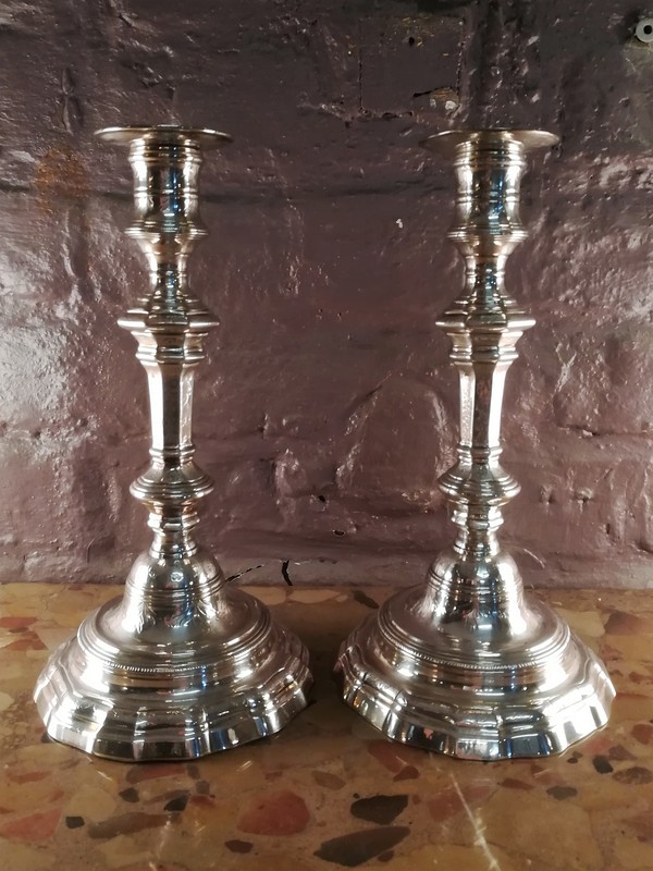 Pair of silver bronze candlesticks