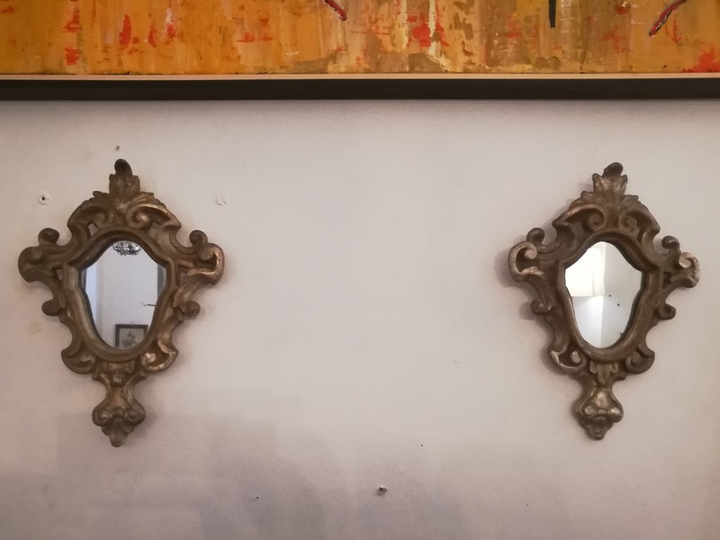 Pair of small Louis XV style mirrors in silver wood
