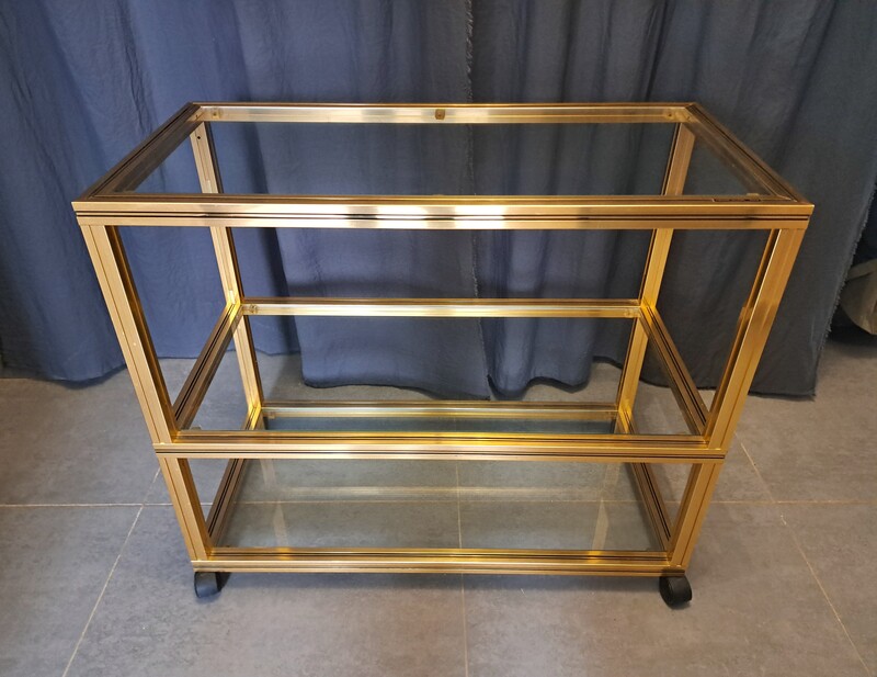 Pierre Vandel rolling trolley in gold aluminum with 3 glass shelves