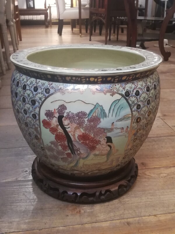 Polychrom porcelain chinese flowerpot on carved wood base