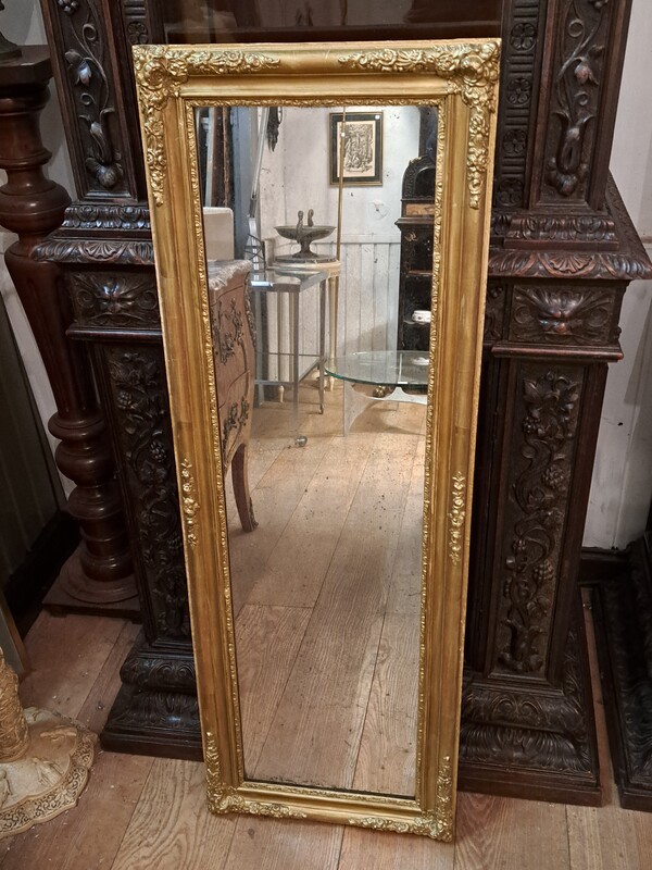 Rectangular gilded stucco mirror