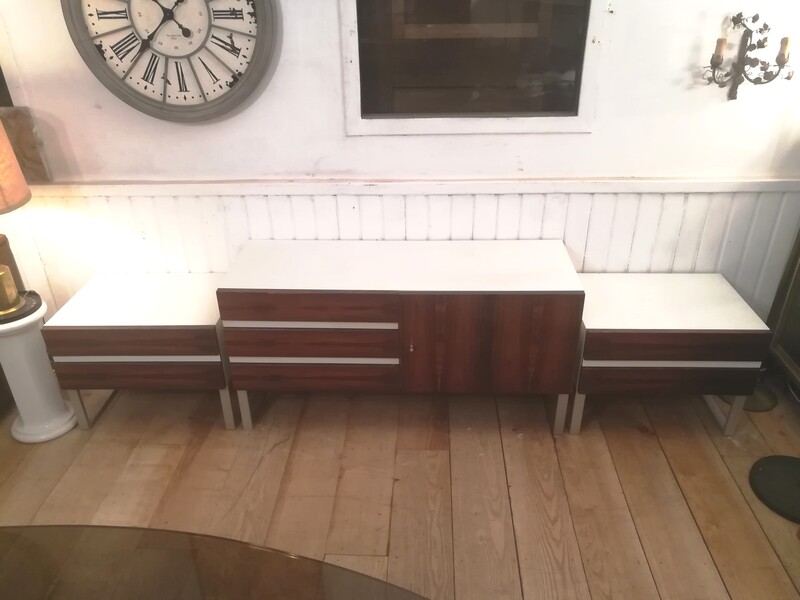 Rosewood and laminate dresser and pair of bedside tables