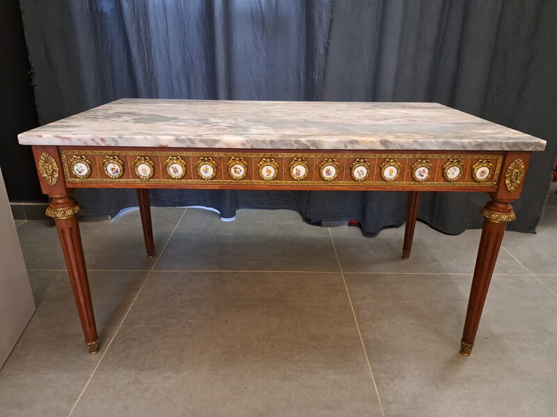 Walnut and marble top coffee table with bronze medallions